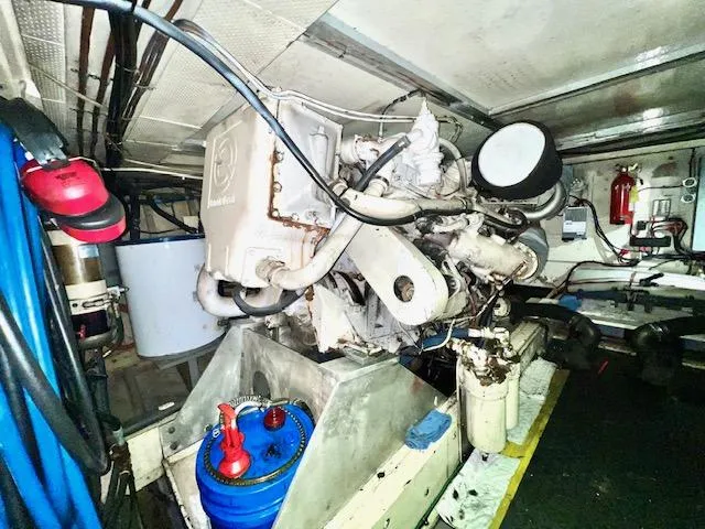 Slide: The Image of 1978 Jones-Goodell Pilothouse engine room with machinery and equipment. - 30