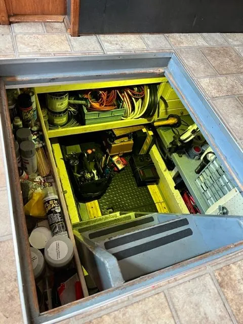 Slide: The Image of Hidden storage compartment in a 1978 Jones-Goodell Pilothouse boat. - 34