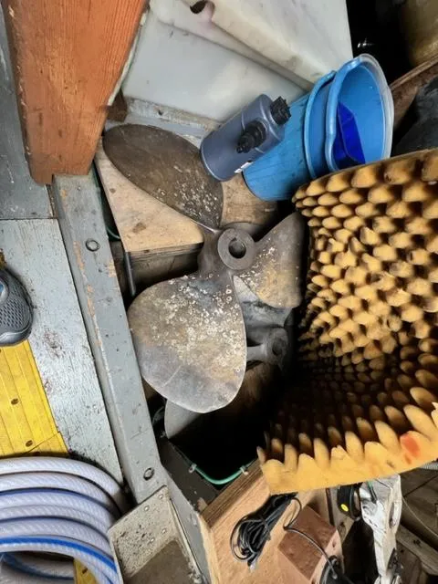 Slide: The Image of Old boat propeller in storage on a 1978 Jones-Goodell Pilothouse. - 40