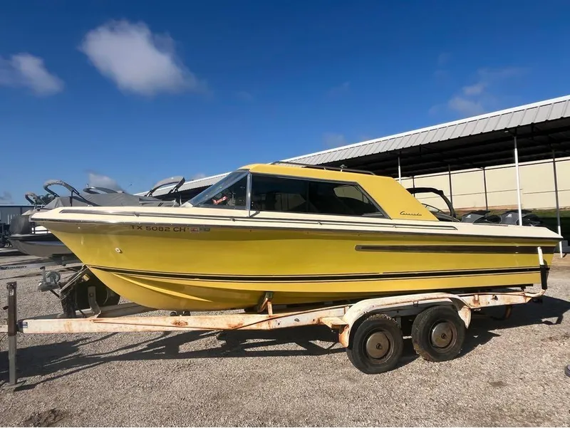 The Image of Yellow 1972 Century Classic Coronado boat on trailer. - 1