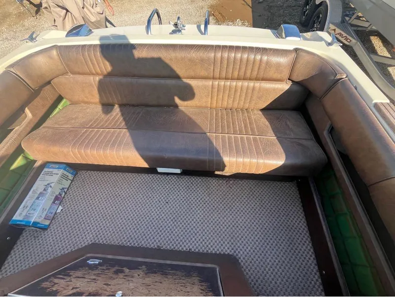 Slide: The Image of Interior of a 1972 Century Classic Coronado boat with brown leather seating. - 3