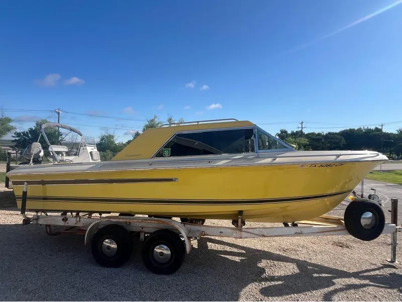 Slide: The Image of Yellow 1972 Century Classic Coronado boat on trailer. - 5