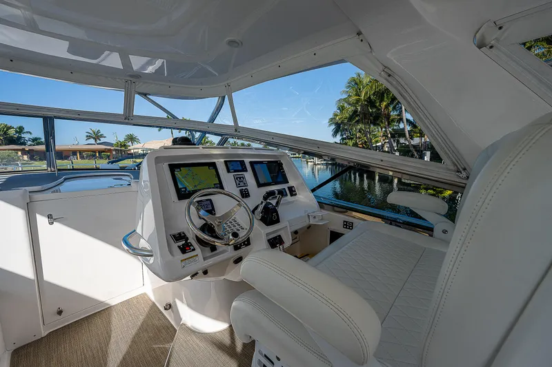 Slide: The Image of Interior of 2014 Intrepid 475 Sport Yacht with modern navigation equipment. - 21