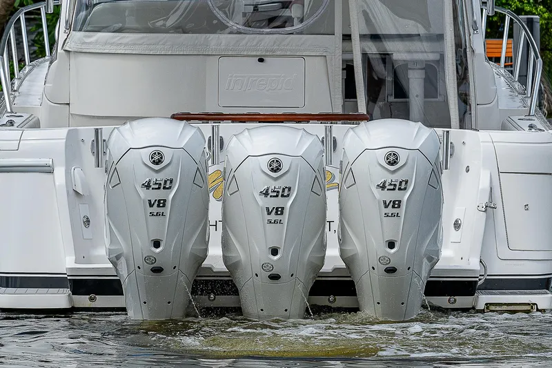 Slide: The Image of 2014 Intrepid 475 Sport Yacht with triple 450 V8 outboard engines. - 4