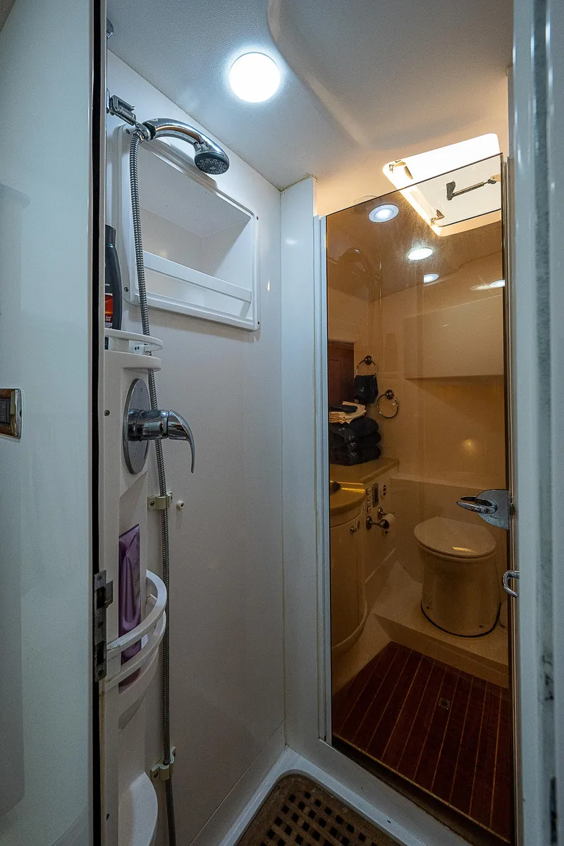 Slide: The Image of Bathroom interior of 2014 Intrepid 475 Sport Yacht with shower and toilet. - 45