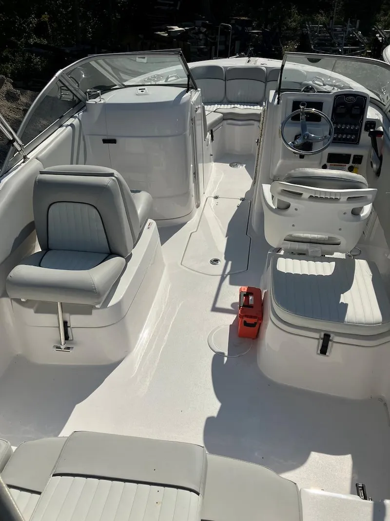 Slide: The Image of 2023 Sea Fox 226 Traveler boat interior with seating and steering console. - 24