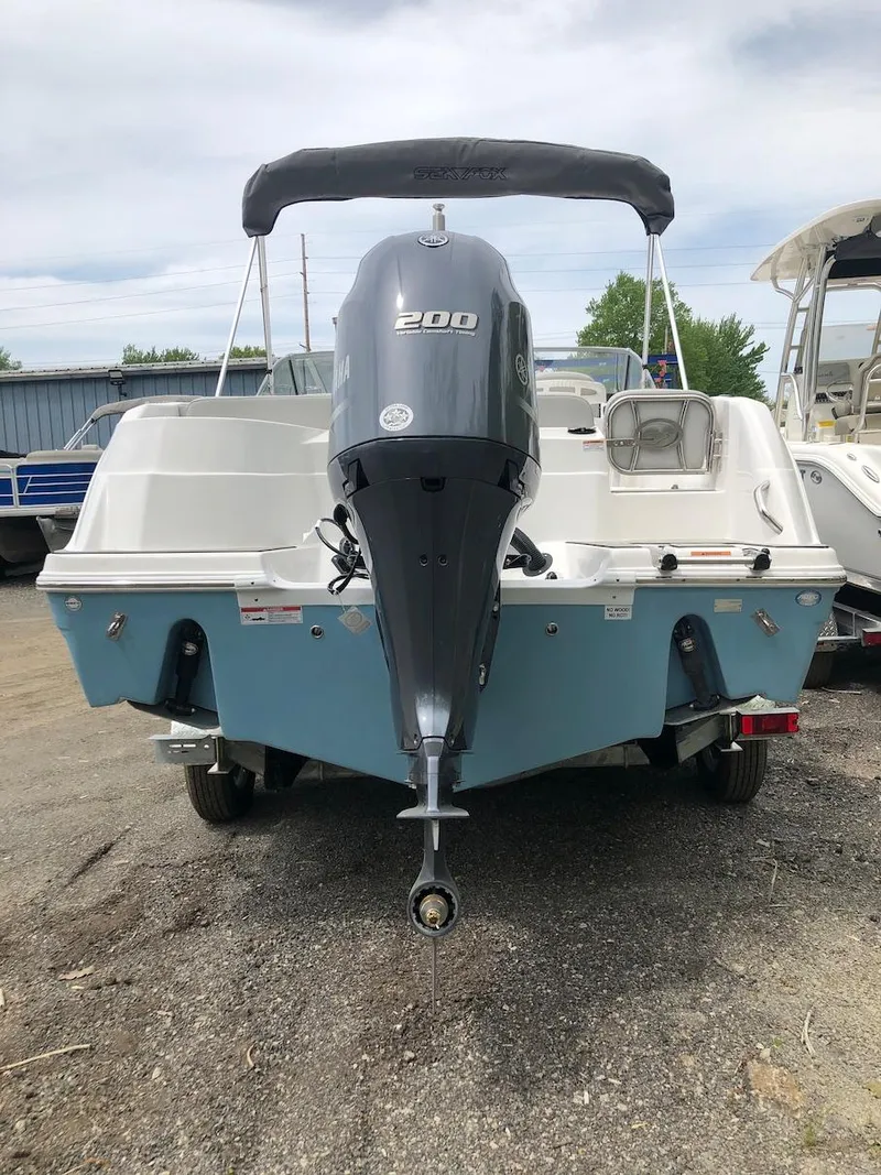 Slide: The Image of 2023 Sea Fox 226 Traveler boat with 200 HP outboard motor, rear view. - 3