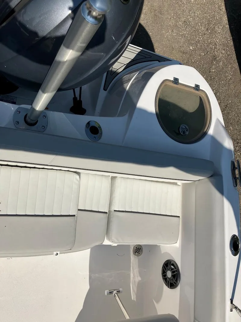 Slide: The Image of 2023 Sea Fox 226 Traveler boat interior with seating and storage compartments. - 33