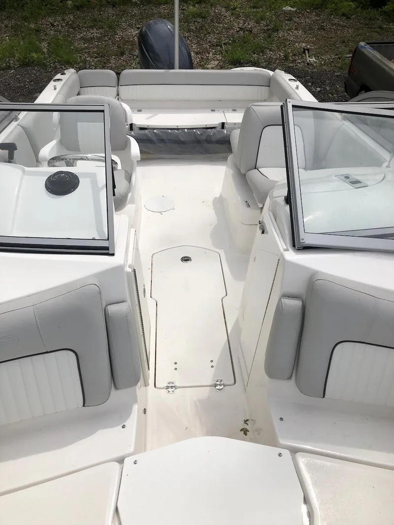 Slide: The Image of 2023 Sea Fox 226 Traveler boat interior with seating and windshield. - 8