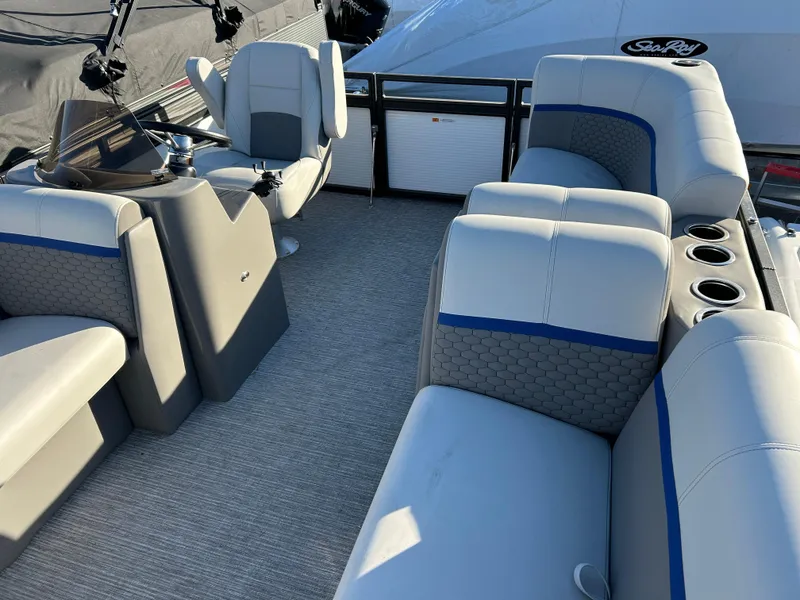 Slide: The Image of 2023 Qwest 814 CTR Cruise boat interior with gray and blue seating. - 4