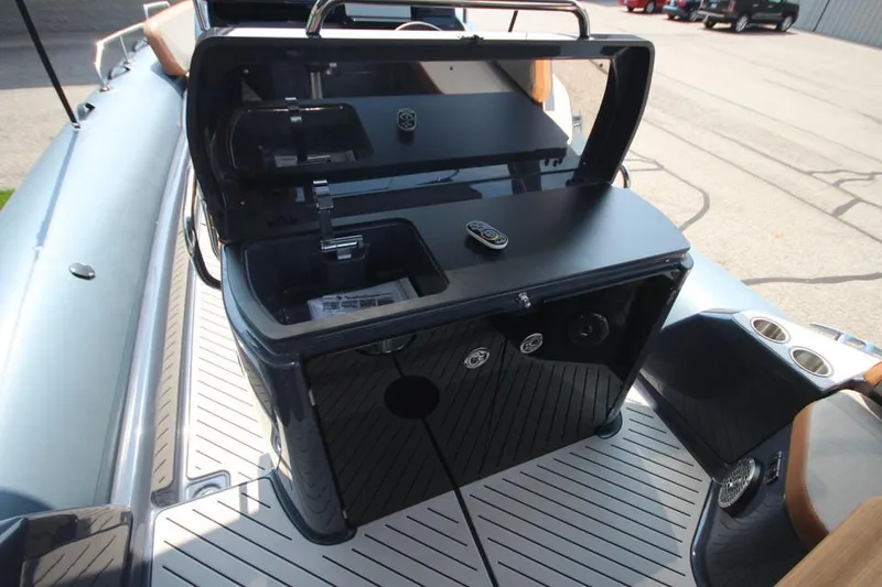 Slide: The Image of 2024 Zodiac MEDLINE 9 NEO Twin 300hp boat interior with open storage compartment. - 20