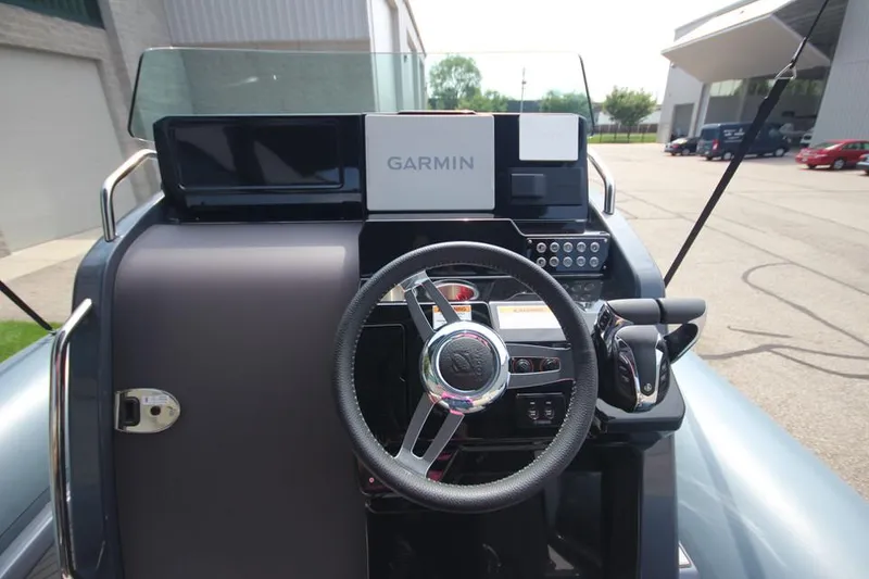 Slide: The Image of 2024 Zodiac MEDLINE 9 NEO Twin 300hp boat dashboard with Garmin navigation system. - 25