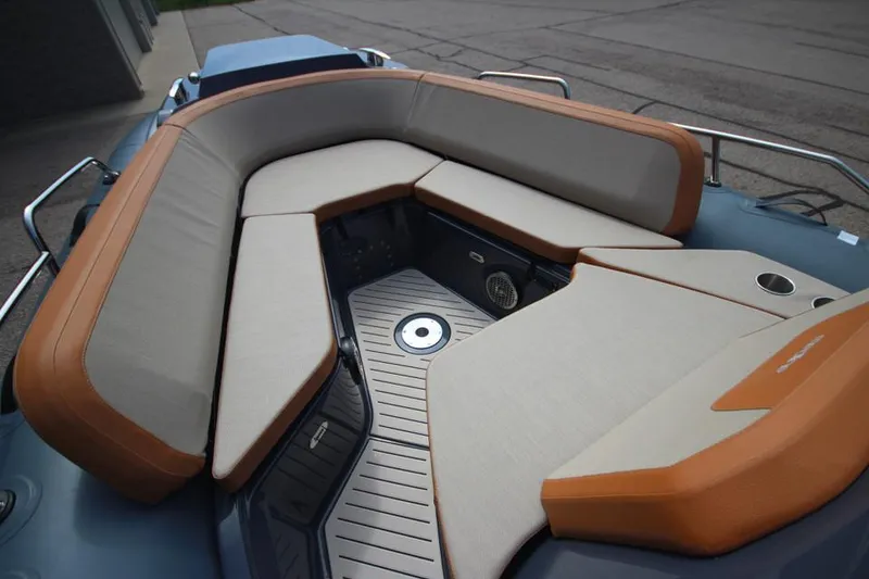 Slide: The Image of 2024 Zodiac MEDLINE 9 NEO Twin 300hp boat with cushioned seating area. - 29