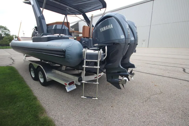 Slide: The Image of 2024 Zodiac MEDLINE 9 NEO Twin 300hp boat on trailer, rear view. - 6