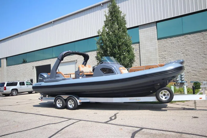 Slide: The Image of 2024 Zodiac MEDLINE 9 NEO Twin 300hp boat on a trailer outside a building. - 8