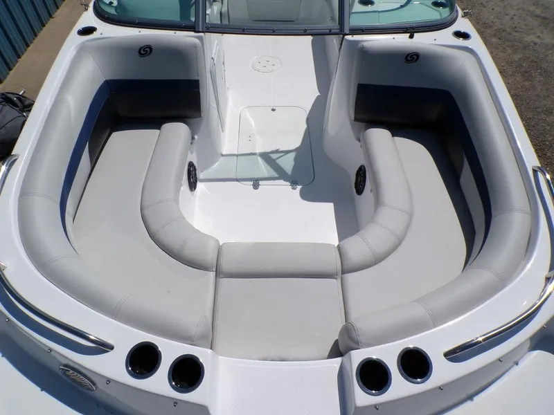Slide: The Image of 2023 Hurricane SunDeck 187 OB boat with spacious seating and cup holders. - 13
