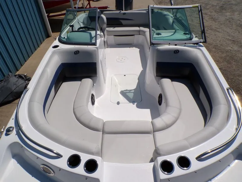 Slide: The Image of 2023 Hurricane SunDeck 187 OB boat interior with spacious seating and windshield. - 15