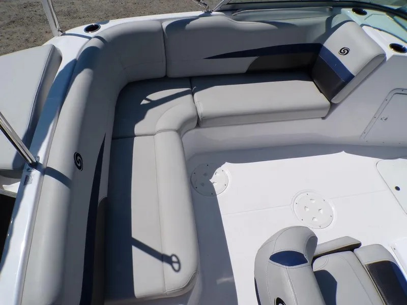 Slide: The Image of 2023 Hurricane SunDeck 187 OB boat interior with cushioned seating. - 20
