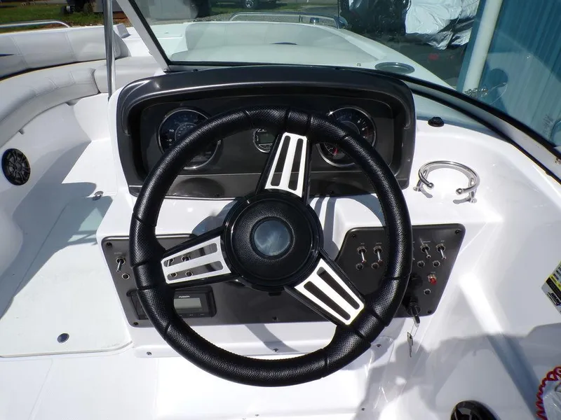 Slide: The Image of 2023 Hurricane SunDeck 187 OB boat steering console and dashboard. - 21
