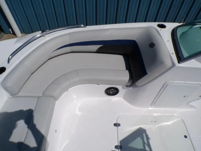 Slide: The Image of 2023 Hurricane SunDeck 187 OB boat interior with cushioned seating. - 25