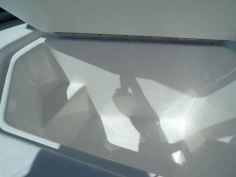 Slide: The Image of Open storage compartment of 2023 Hurricane SunDeck 187 OB boat. - 37