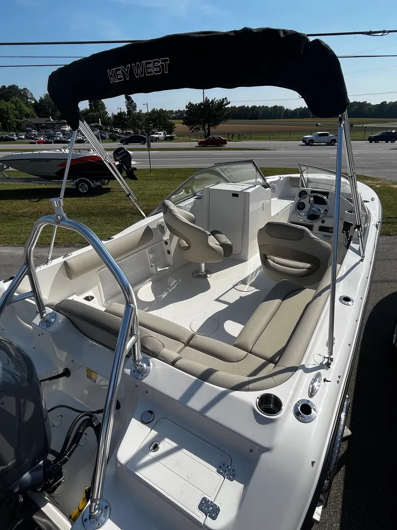 Slide: The Image of 2024 Key West 203 DFS boat with seating and canopy. - 3