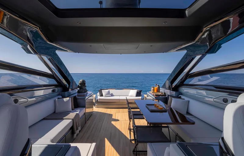 Slide: The Image of Luxurious interior of the 2025 Riva 68' DIABLE yacht with ocean view. - 11