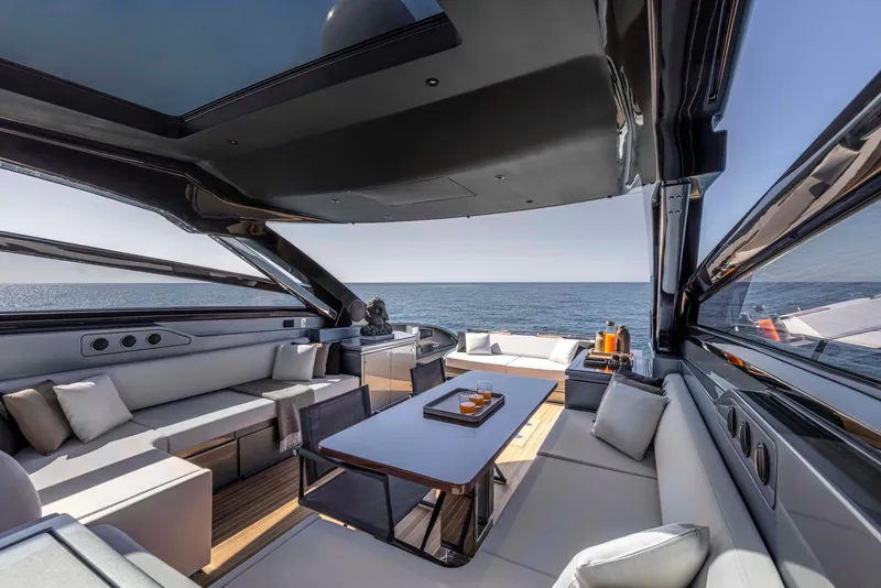 Slide: The Image of Luxurious interior of the 2025 Riva 68' DIABLE yacht with ocean view. - 12