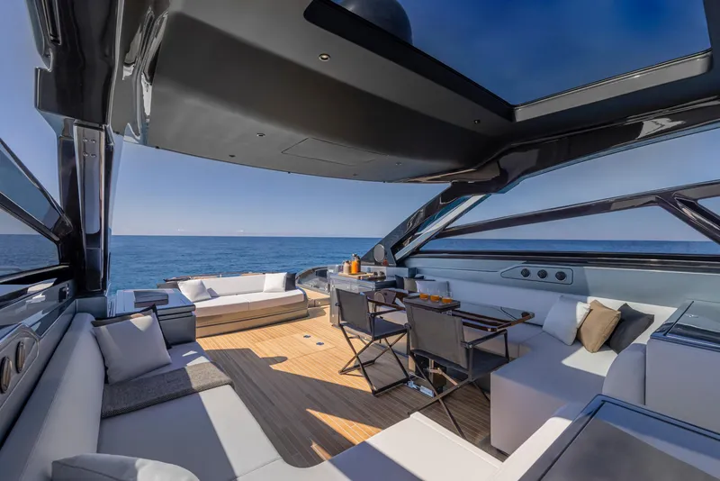 Slide: The Image of Luxurious deck of the 2025 Riva 68' DIABLE yacht with ocean view. - 13