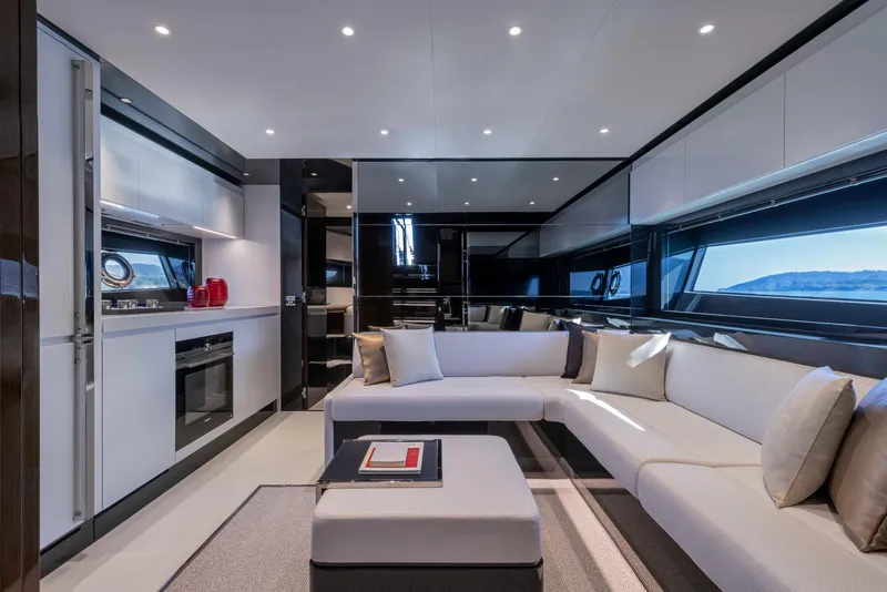 Slide: The Image of Luxurious interior of the 2025 Riva 68' DIABLE yacht with modern furnishings and panoramic windows. - 15