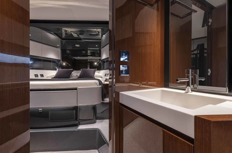 Slide: The Image of Luxury interior of 2025 Riva 68' DIABLE yacht with bedroom and bathroom. - 22