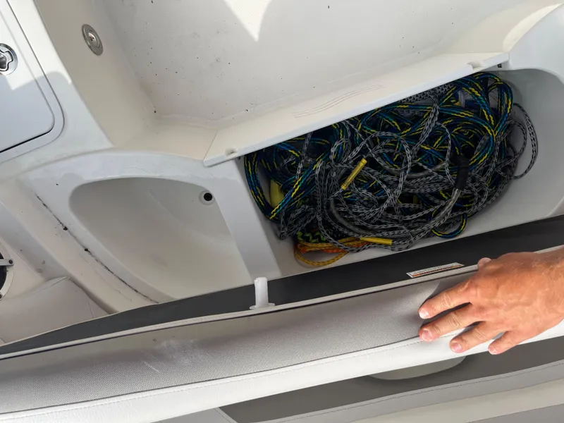 Slide: The Image of Storage compartment of 2017 Hurricane SD 2400 I/O boat with coiled ropes. - 14