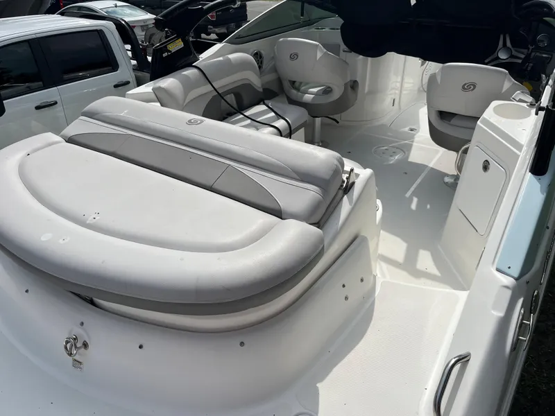 Slide: The Image of 2017 Hurricane SD 2400 I/O boat interior with white and gray seating. - 17