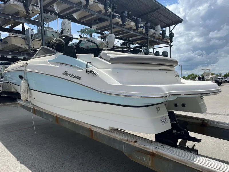Slide: The Image of 2017 Hurricane SD 2400 I/O boat on a trailer in a marina. - 20