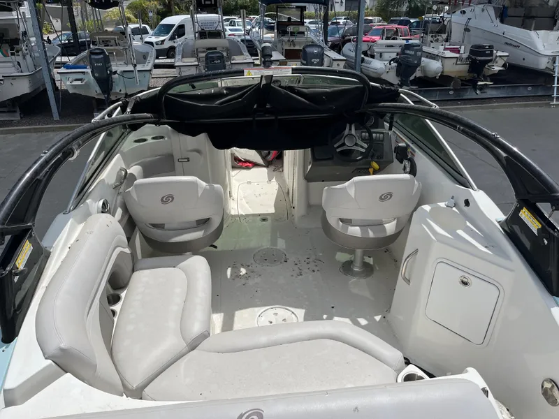 Slide: The Image of 2017 Hurricane SD 2400 I/O boat interior with seating and steering wheel. - 25