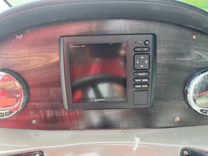 Slide: The Image of 2017 Hurricane SD 2400 I/O dashboard with Garmin GPS and gauges. - 8