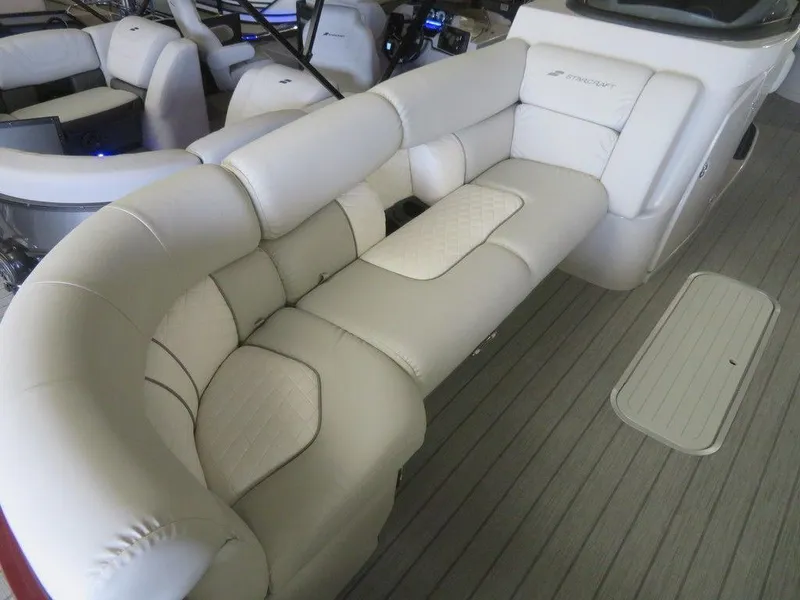 Slide: The Image of 2023 Starcraft SX 25 Q boat interior with luxurious seating. - 12