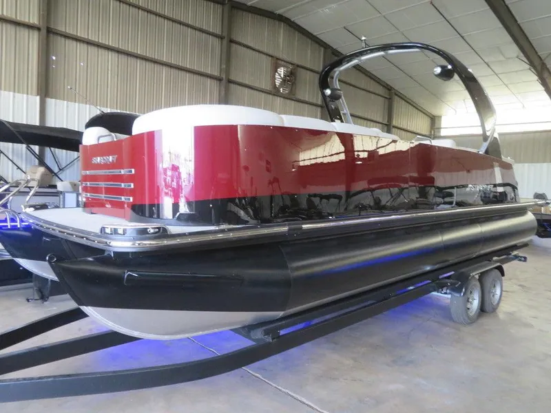 Slide: The Image of 2023 Starcraft SX 25 Q pontoon boat in a warehouse. - 5