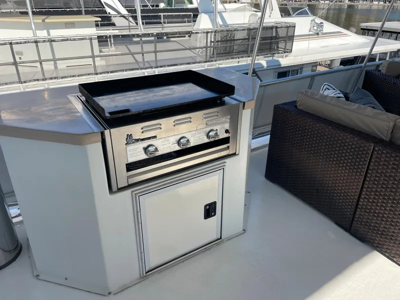 Slide: The Image of Outdoor grill on a 2002 Stardust Cruisers houseboat deck. - 28