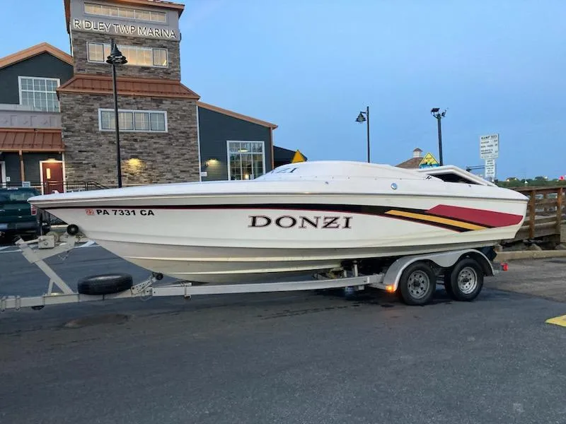Slide: The Image of 1997 Donzi 22ZX speedboat on trailer at Ridley Township Marina. - 14