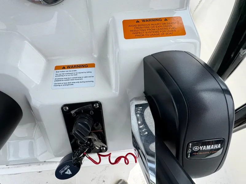 Slide: The Image of 2018 Robalo R200 Center Console with Yamaha controls and safety warnings visible. - 11