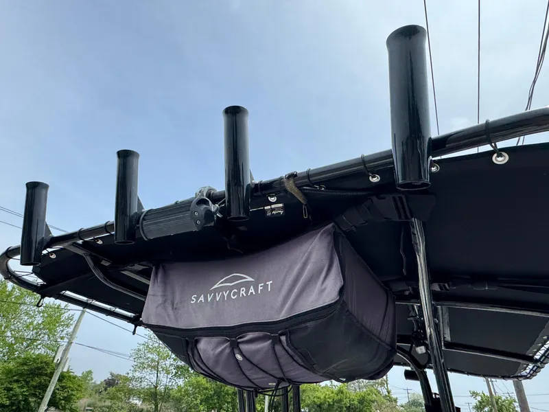 Slide: The Image of 2018 Robalo R200 Center Console with Savvycraft storage bag and rod holders. - 4