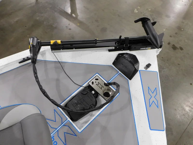 Slide: The Image of 2023 Xpress H18C boat deck with trolling motor and foot pedal. - 10