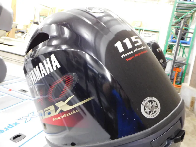 Slide: The Image of 2023 Xpress H18C boat with Yamaha 115 four-stroke outboard motor. - 2