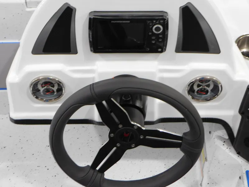 Slide: The Image of Steering console of 2023 Xpress H18C boat with modern controls and gauges. - 5