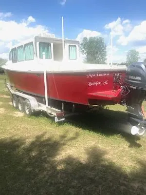 Slide: The Image of Red 2008 Custom Gasparek Marine Eco Trawler on trailer, Yamaha motor, sunny day. - 15