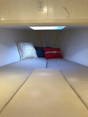 Slide: The Image of Cozy cabin interior of 2008 Gasparek Marine Eco Trawler with cushions and pillows. - 4