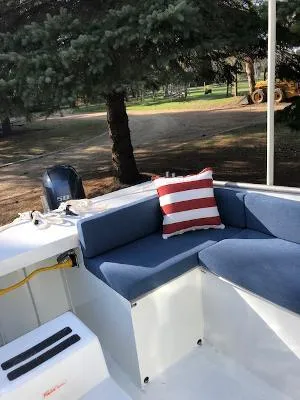 Slide: The Image of 2008 Custom Gasparek Marine Eco Trawler with blue seating and striped pillow. - 7