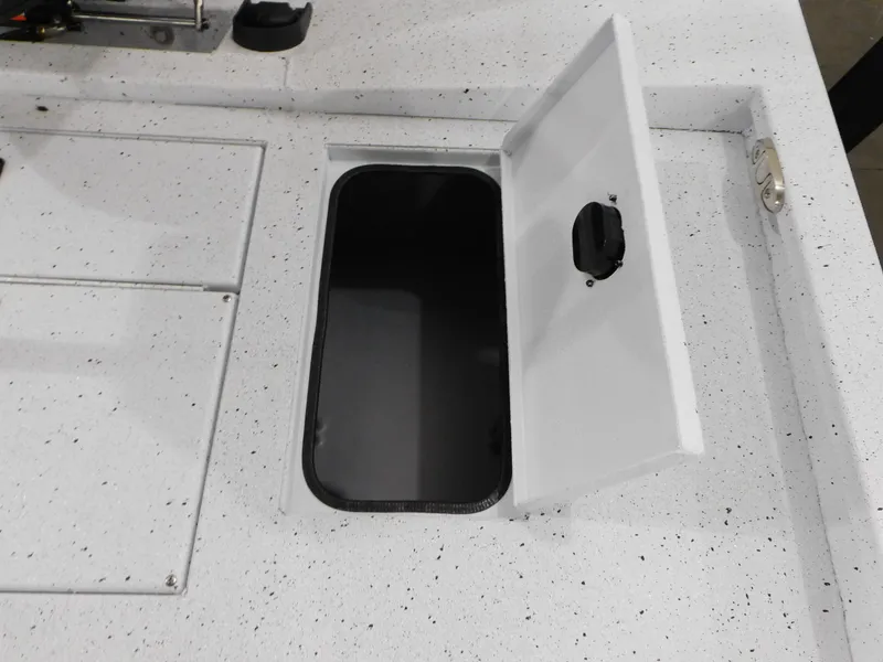 Slide: The Image of 2023 Xpress H190B boat storage compartment with open hatch. - 10