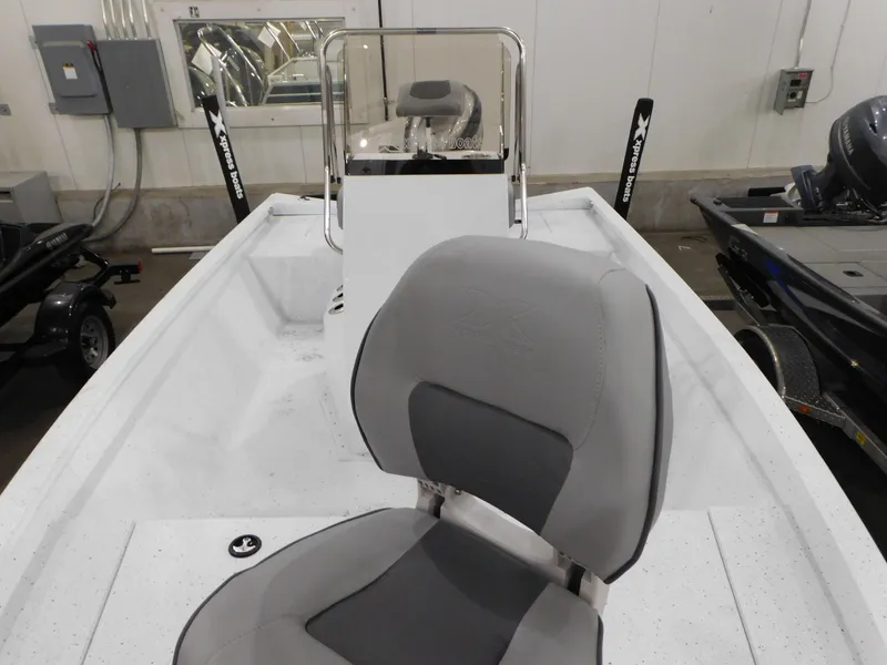 Slide: The Image of 2023 Xpress H190B boat interior with gray seating and center console. - 22